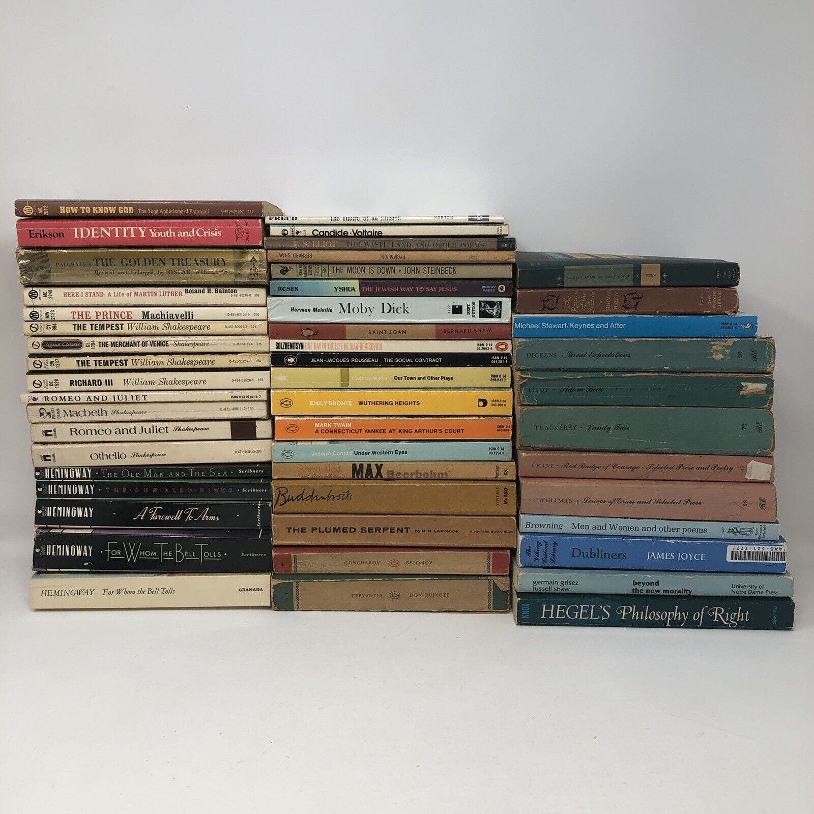 Vintage lot of 50 Paperback Classics by Hemingway Shakespeare Voltaire Melville - Uncle Buddy's Beard & Used Books
